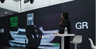 Corporate product launch event featuring professional LED display and AV production setup